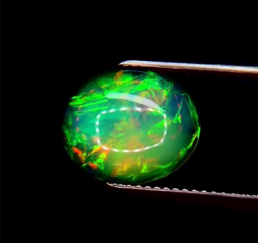 Natural 3.31cts Oval Cabochon-Cut 13x11x4.5mm Color-Play White Opal, untreated.